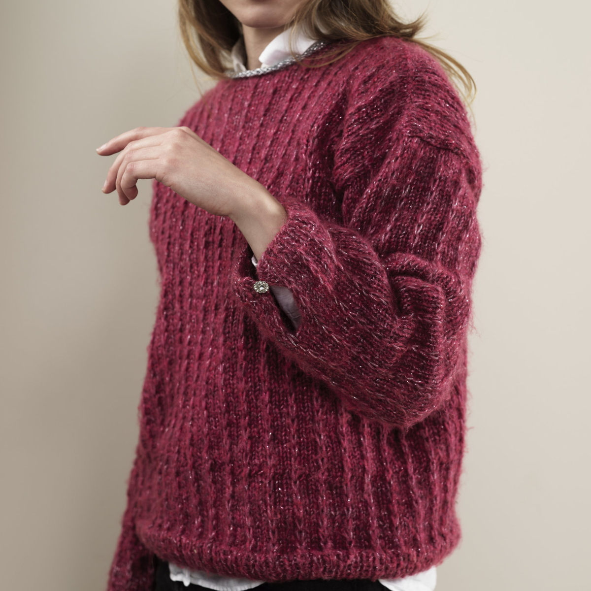 Sticka glitterskimrande tröjan Isa