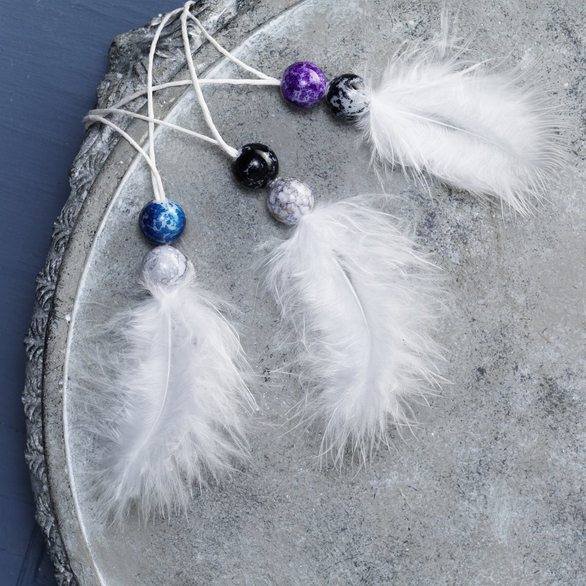 Beaded feathers