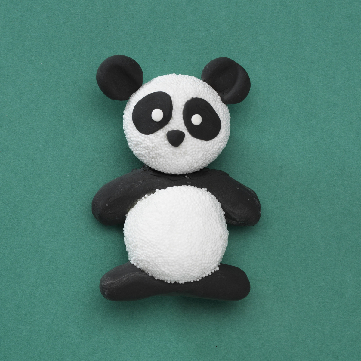 Supersød panda i ler