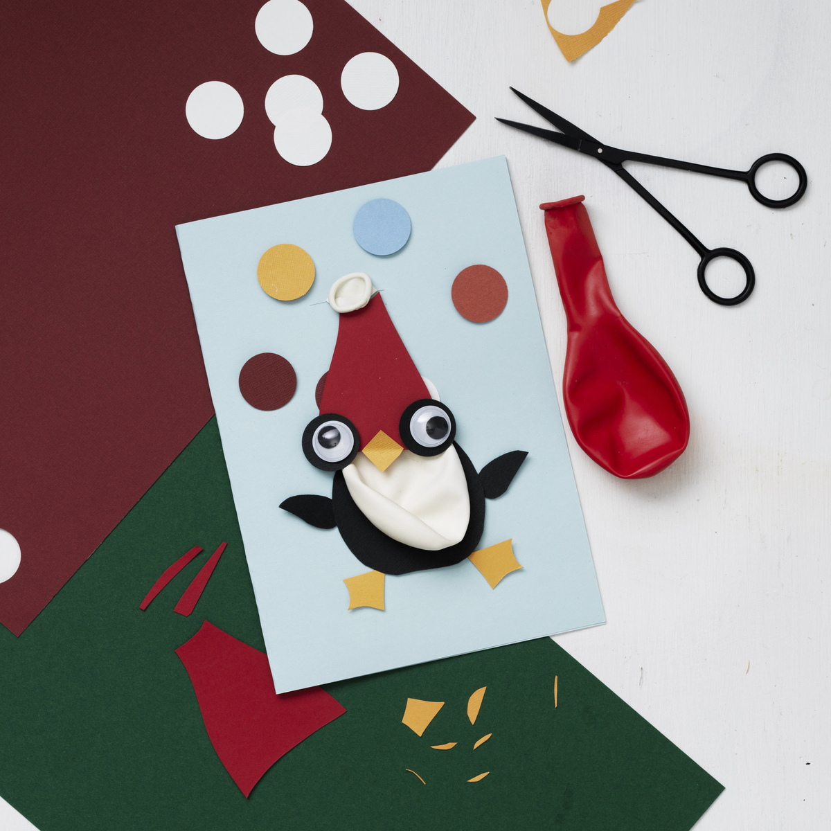 Lag et julekort med pingvinmotiv