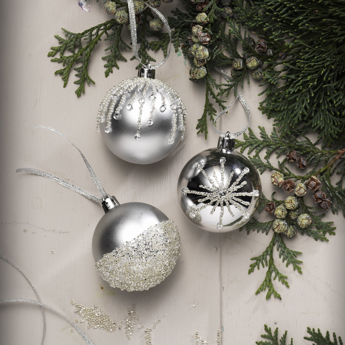 Decorate holiday ornaments with beads
