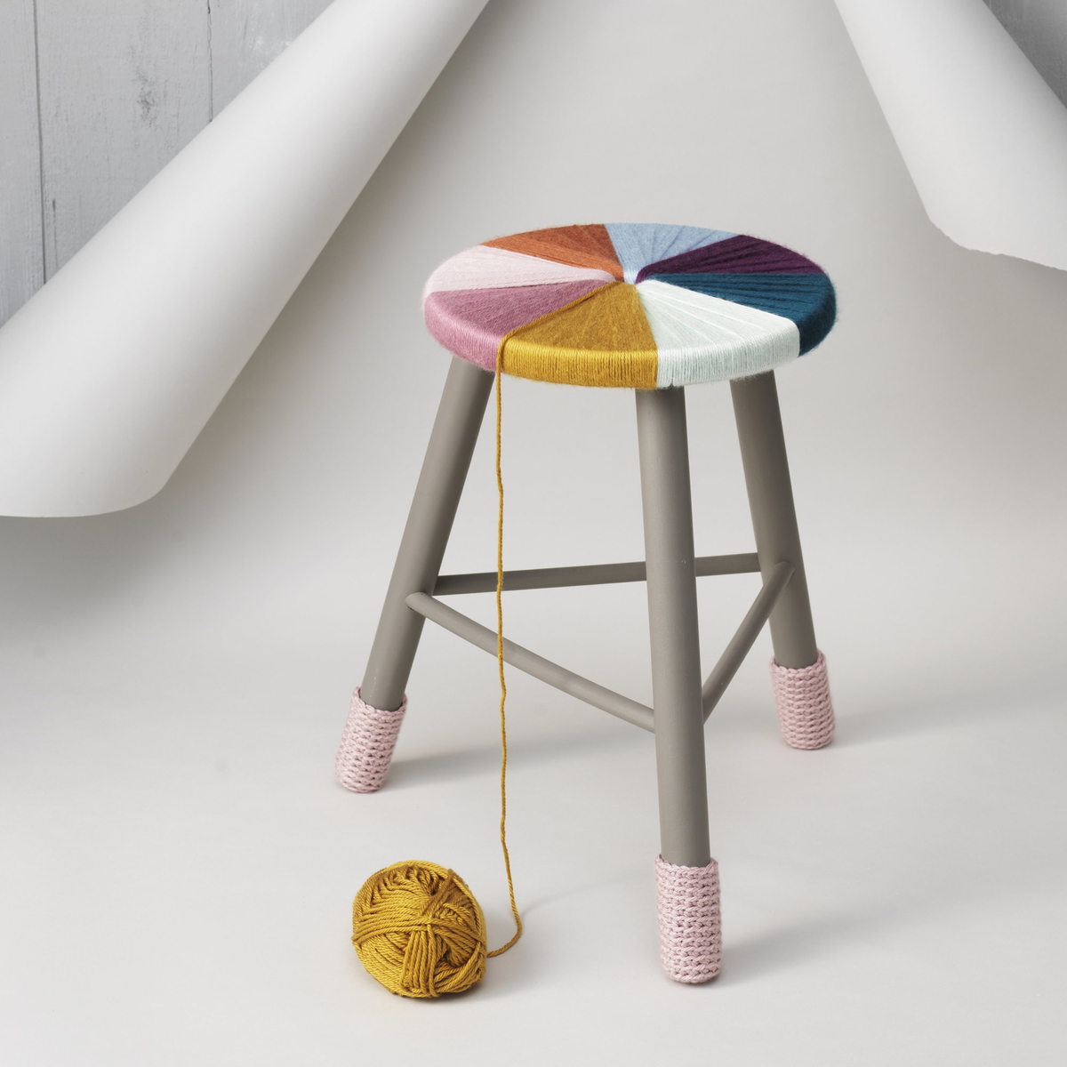 Spruce up a stool with yarn