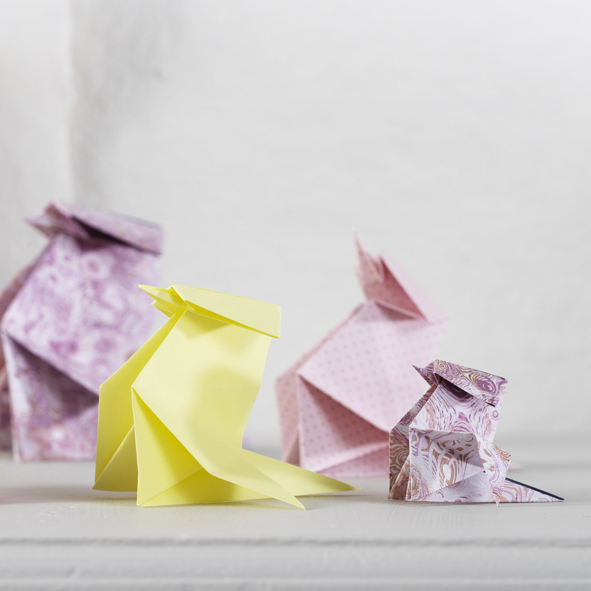 Brett søte fugler i origami